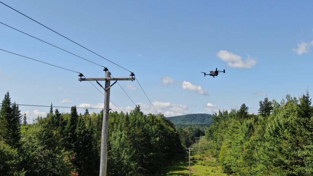 One of our drones inspecting power lines